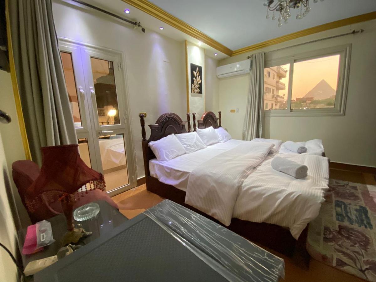 Asma Pyramids View Hotel Kafret el-Gabal Buitenkant foto