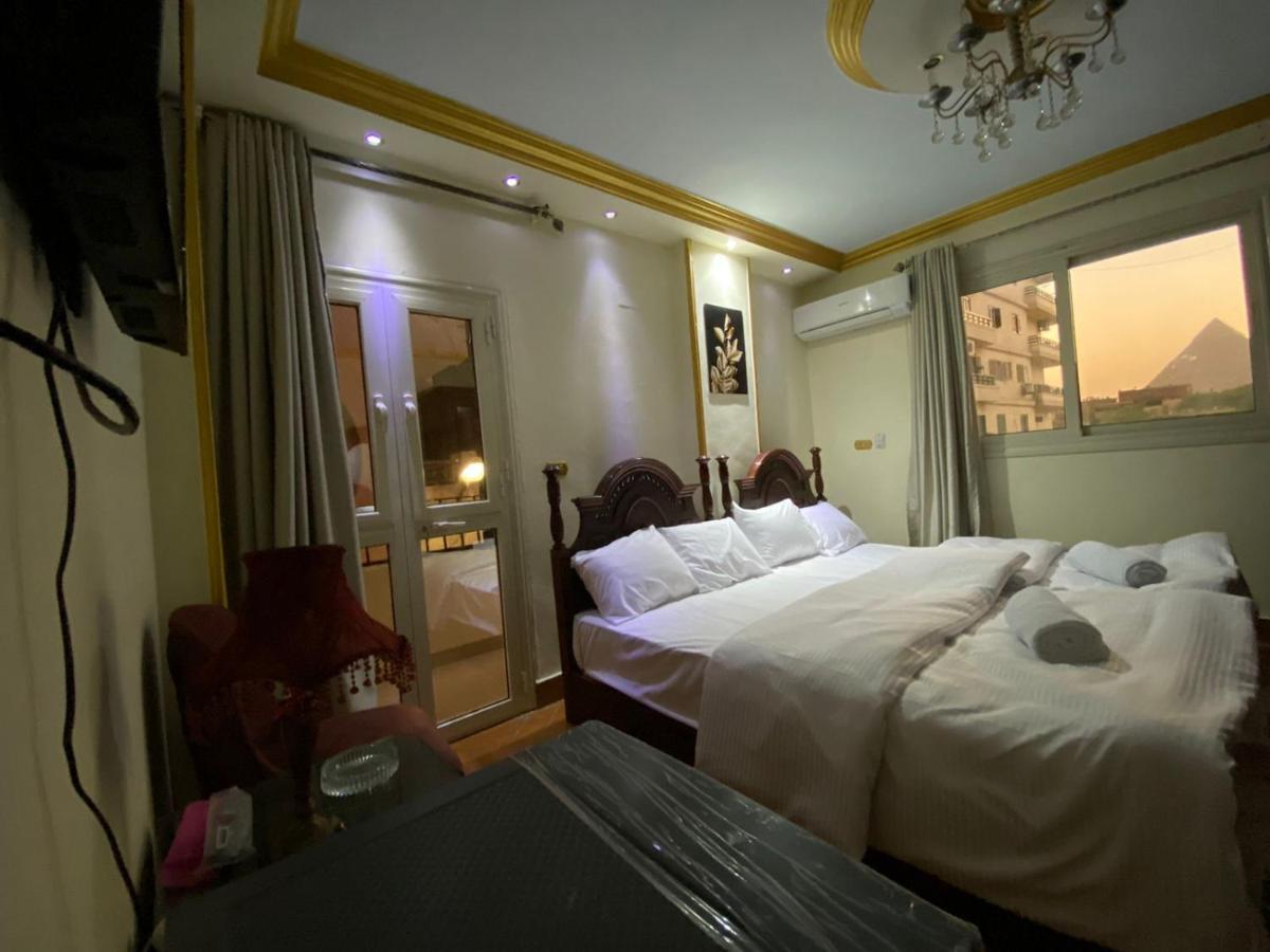 Asma Pyramids View Hotel Kafret el-Gabal Buitenkant foto